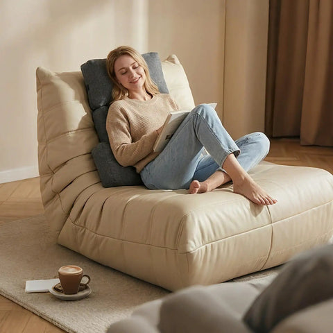 Woman relaxing on a recliner with neck and lumbar pillow set for pain relief and comfort during long sessions