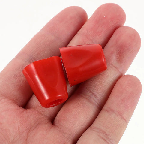 Red rubber caps held in hand, not Two Pack Replacement Nut Set For Walking And Sabre Fencing Gear Stainless Steel Threaded Nuts