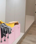 Super Durable Collapsible Storage Cubes 10 5 Inch Foldable Fabric Bins To Tackle Clutter and Keep Your Digs Organized in pink holding blankets and pillows.