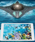 Smart App Controlled Underwater Drone With HD Camera and LED Lights above water, tablet showing live underwater video.