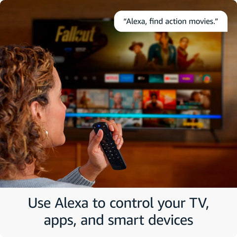 Woman using Alexa Voice Remote Pro For Fire TV with Remote Finder Backlit Buttons in home theater setup.