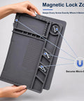 Hands holding a grey Top Tier Heat Resistant Silicone Soldering Mat With Magnetic Screw Retainer Tray showing magnetic screw zones.