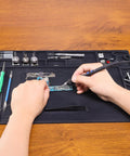 M170 Silicone Soldering Mat 17.3 By 12.2 Inches Heat Resistant With Eight Function Zones Magnetic Soldering Pad in use
