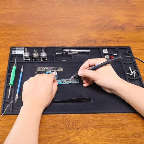 M170 Silicone Soldering Mat 17.3 By 12.2 Inches Heat Resistant With Eight Function Zones Magnetic Soldering Pad in use
