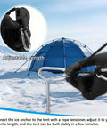 Fourteen Piece Ice Fishing Anchor Tool Kit With Drill Adapter securing an ice fishing tent with adjustable length tensioner.