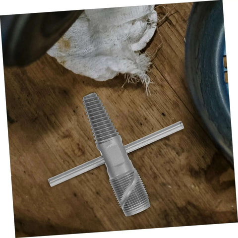 Double Head Screw Extractor Set for Stripped Screws and Broken Water Pipes on wooden surface