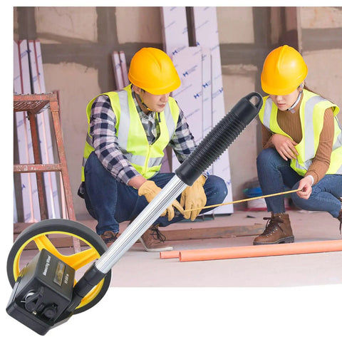 LiebeWH Measuring Wheel 0-9999.9m Telescopic Handle 0.5% Accuracy being used by workers on a construction site.