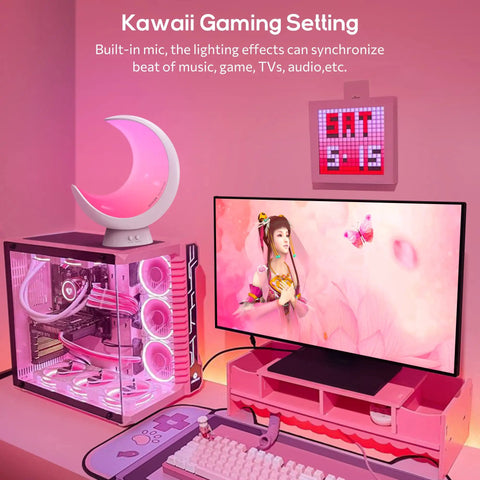 Gaming setup with glowing pink Super Handy Cordless Moon Lamp For Your Bedside Table With Alexa Voice Control And App Connectivity