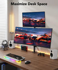Vertical Dual Monitor Mount For Two 17 To 32 Inch Screens With Height Adjustable Arms And C Clamp Ergonomic Desk Mount Holds Up To 17.6 Lbs Per Screen Stackable Setup For Maximized Comfort And Productivity showing stacked monitors on a desk.