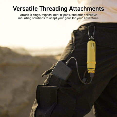 Person with rugged 5000mAh outdoor power bank with 15W USB C fast charging, IP67 waterproof and shockproof battery pack attached to belt.