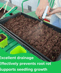 Hand watering seedlings in 1020 Mesh Trays With Holes Mesh Bottom Seed Starting Tray For Microgreens Germination And Propagation 10 By 21 Inches Heavy Duty 6 Pack Built For Wet Soil With Superior Drainage And Airflow