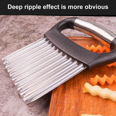 Crinkle cutter with silver stainless steel wavy blades and black ergonomic handle for potatoes and vegetables.