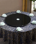Top Shelf Black Tempered Glass Lazy Susan Turntable 90cm Round Rotating Dining Tray on elegant table setting.