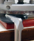 Close-up of Sign Making Router Kit With 2.5 Inch And 1.5 Inch Horizontal Letters, showing metal bushings and low-profile clamps.