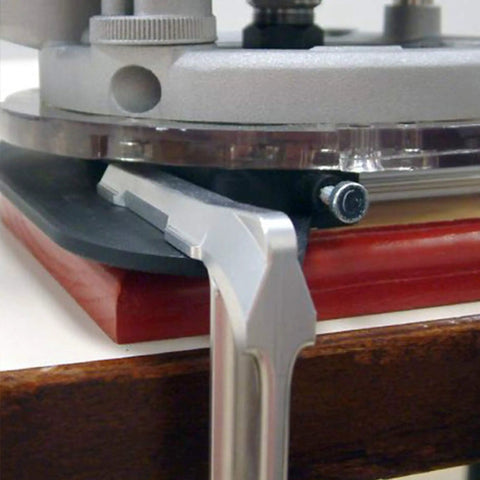 Close-up of Sign Making Router Kit With 2.5 Inch And 1.5 Inch Horizontal Letters, showing metal bushings and low-profile clamps.