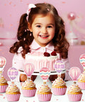 Girl with cake and 36 Pink Hot Air Balloon Cupcake Toppers For Girls Birthday Party Decorations Adventure Awaits Baby Shower Decor