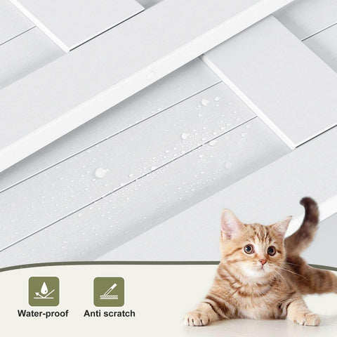 Close-up of waterproof and anti-scratch white MDF wood panel of Double 14 Inch Bifold Barn Doors 28 By 84 Inches, with a cat sitting near.