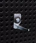 Close-up of perforated panel with metal hook from 67 Inch Lockable Garage Tool Panel With Aluminum Shutter And Three Perforated Panels, Red.