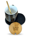 Personalized Coffee Mug Warmer With Auto Shut Off Sensor Touch Smart Heating Coaster Desk Essential Keeps Your Daily Brew Hot gift with a black cup and bamboo coaster.