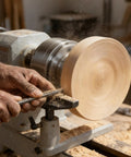 Built Tough 4 Inch Wood Lathe Chuck 4 Jaw Self Centering Bevel Gear Set in use for woodturning with spinning wood piece