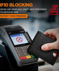 Hand holding an Ultra Slim RFID Blocking Bifold Wallet For Men With Carbon Fiber Look near a card reader, highlighting RFID blocking.