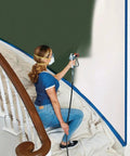 Pro Grade Airless Paint Sprayer With A Mean 3000 Psi Kick For Unthinned Latex Primers And Stains used by a woman painting a wall.