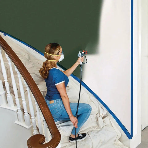 Pro Grade Airless Paint Sprayer With A Mean 3000 Psi Kick For Unthinned Latex Primers And Stains used by a woman painting a wall.