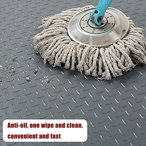 Mop cleaning surface of Heavy Duty Red PVC Garage Floor Mat Roll 1.5x2m Cuttable, Non Slip, Easy to Clean, Durable Floor Protector