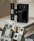 Rock Solid Brushed Steel Hydraulic Glass Door Hinge Dead Quiet Self Closing System Bulletproof Hardware on a book.