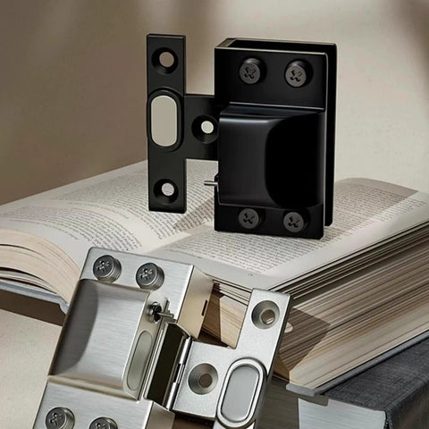 Rock Solid Brushed Steel Hydraulic Glass Door Hinge Dead Quiet Self Closing System Bulletproof Hardware on a book.