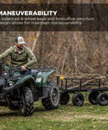 Heavy-Duty Steel Utility Cart With 4 Cu Ft Bed And 900 LB Load Capacity, Black Towable Hauling Wagon in use for yard work