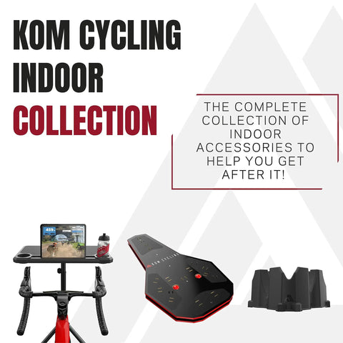 KOM Cycling indoor trainer accessories with phone holder, ramp, and bike block for road bikes setup.