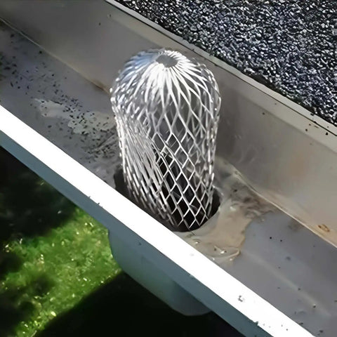Expandable 3.5 Inch Aluminum Gutter Downspout Guards 4 Pack Leaf Filter Strainer Protectors installed in gutter to prevent clogs.