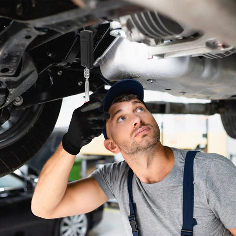 Mechanic using Two Pack Telescoping Inspection Mirror With LED Light Round And Square Heads Handy Tool under vehicle