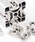 Aluminum extrusion showing M6 T slot nuts, forged from nickel plated carbon steel for 4545 aluminum extrusions featuring hammer head fasteners.