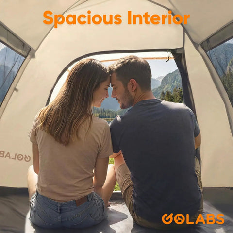 Two Person No Fuss Instant Camping Tent With 60 Second Setup, inner view with mesh ventilation, couple sitting inside.