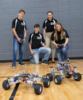 Students control robots fitted with "All Terrain Tire Kit For TETRIX MAX Robotics, Monster Truck Style Wheels With Foam Inserts"