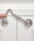 Close-up of Two Pack Brushed Nickel Stainless Steel Hook And Eye Latch, 4 inch, mounted on a white cabinet door.