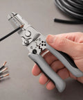 Heavy Duty Wire Stripper Pliers Manual Hand Tool With Stripping Cutting And Gripping Sections For Electrical Work Home Wiring Jobs, held in hand.