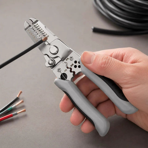 Heavy Duty Wire Stripper Pliers Manual Hand Tool With Stripping Cutting And Gripping Sections For Electrical Work Home Wiring Jobs, held in hand.