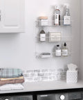 Top Shelf 3 Tier Wall Mounted Metal Rack For Kitchen Pantry Organization Keeps Your Space Slick With Rock Solid Storage For Cans Cleaners And Toiletries In A Clean White Build. Metal rack with cleaning supplies mounted on wall.