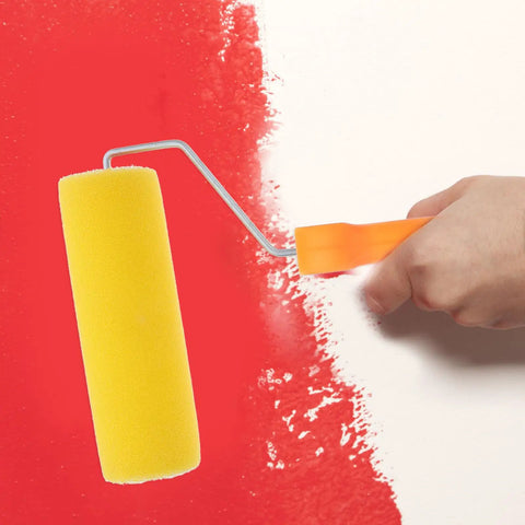 Textured Sponge Paint Roller For Wall Painting With Ergonomic Handle applying yellow sponge roller on red wall.