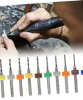 Hands using tool from 30 Piece Tiny Drill Bits For Jewelry Making And PCB Engraving Tungsten Steel Micro Drill Bit Set
