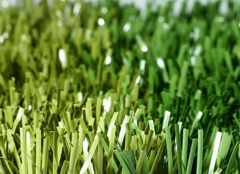 Close-up of green poly synthetic turf from Five By Ten Foot Synthetic Turf Batting Cage Mat For Baseball And Softball Practice.