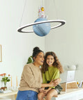 Space Themed Astronaut Pendant Light For Kids Room Dimmable Planet LED Chandelier With 3000K 4000K And 6000K Color Temps in playroom