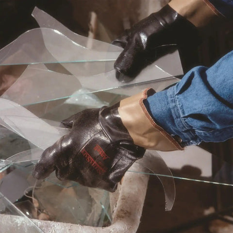 Person wearing Heavy Duty Nitrile Gloves With Kevlar Protection, Palm Coated For That Solid Dry Grip, handling glass pieces.