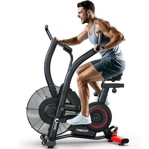 Man using Indoor Upright Air Resistance Fan Bike With Bluetooth, Infinite Air System, dual handlebars, home gym setting
