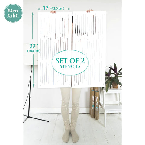 Person holding DIY Friendly Ink Lines Geometric Wall Stencil Set 2 Pack 17x39 Inches For Easy Accent Walls in living room.