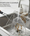 Outdoor Grill Basket For Fish, Shrimp, Veggies And Meat, Stainless Steel With Detachable Heat Resistant Handle being rinsed in sink