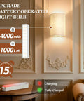 Wireless Rechargeable Wall Sconces Set Of Two Featuring 16 Rgb Hues And Three Warm Tones Delivering An Adjustable 1000 Lumen Glow That Gives Your Space Lowkey Vibes That Truly Slays, showing battery operated light bulb with charging status.